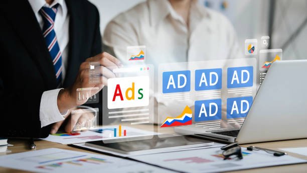 Digital marketing concept, online advertising, website ads and social media. Businessman uses laptop to analyze digital marketing strategy for branding and Ads SEO PPC goals.